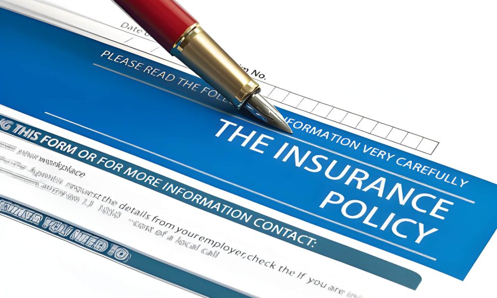 Insurance policy document with pen—Public Adjuster Orlando review and guidance